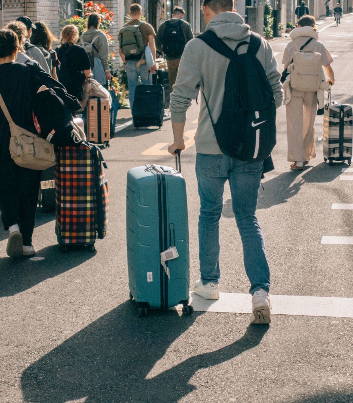Travelers walking through a Japanese street